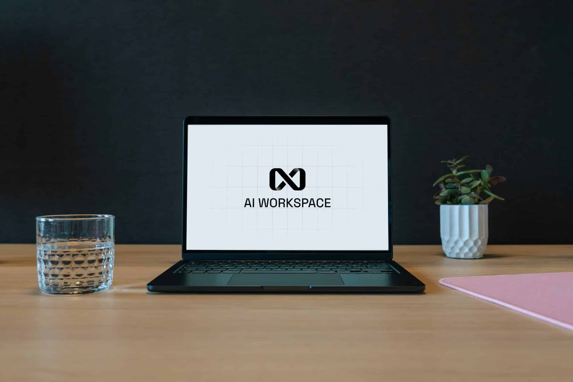 Person using laptop with AI-powered security solutions for small business